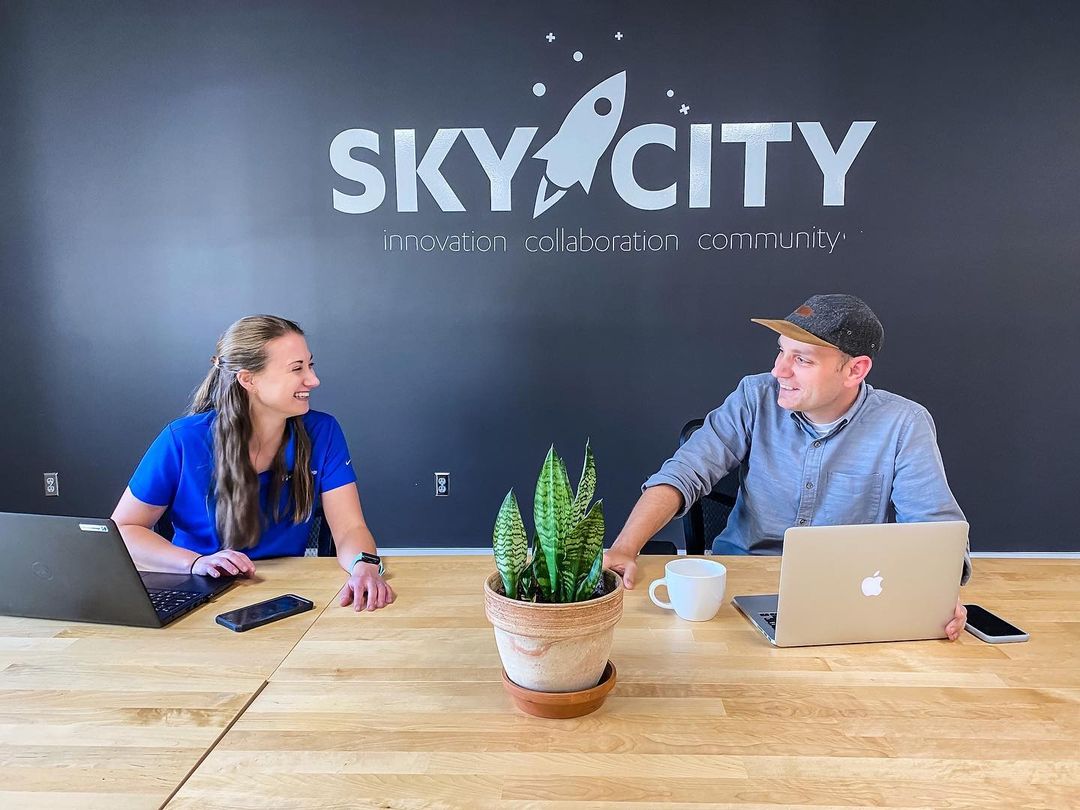 Image of Lane Shuler, one of Sky City's board members, discussing business with a Sky City member